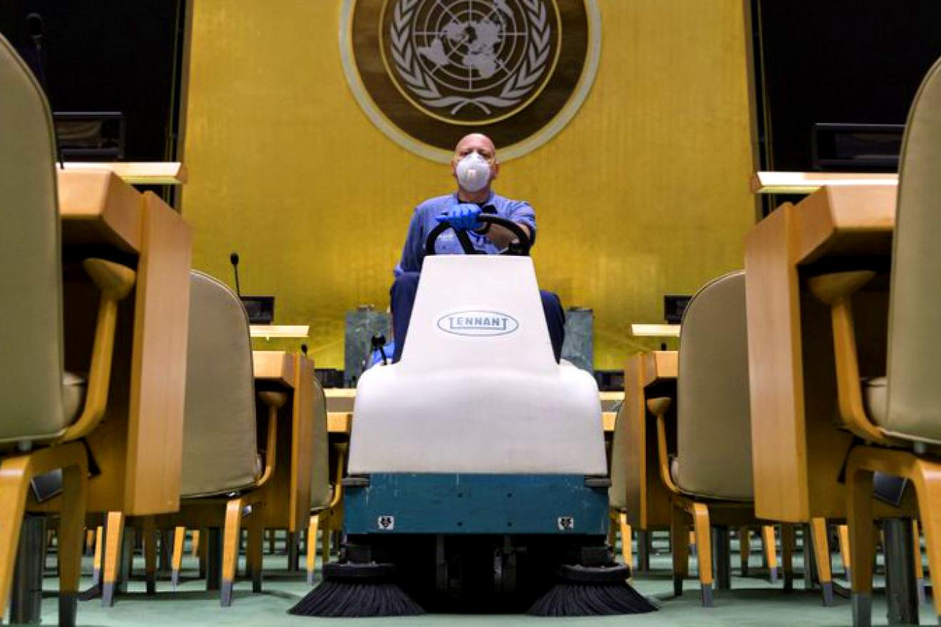 A man on a mopping vehicle in the General Assembly