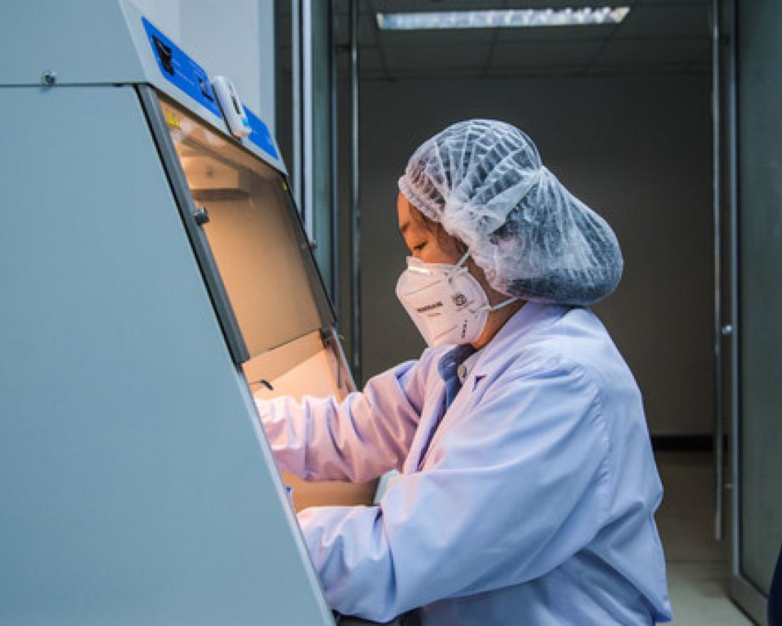 A laboratory technician works at a health and science centre in Bangkok, Thailand. It is a WHO Collaborating Centre for research and training on viral zoonoses.