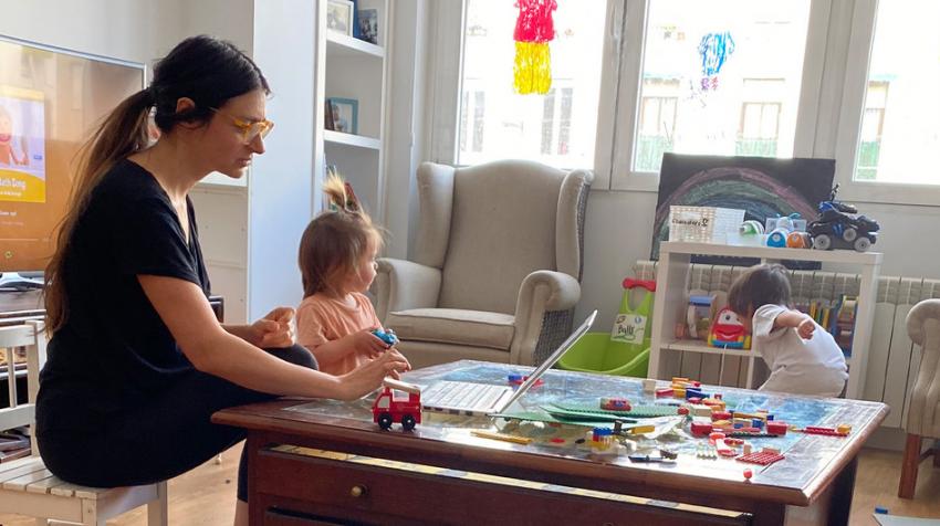 woman with young children at home