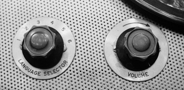 A dial for selecting continuous interpretation in any of the UN 6-official languages